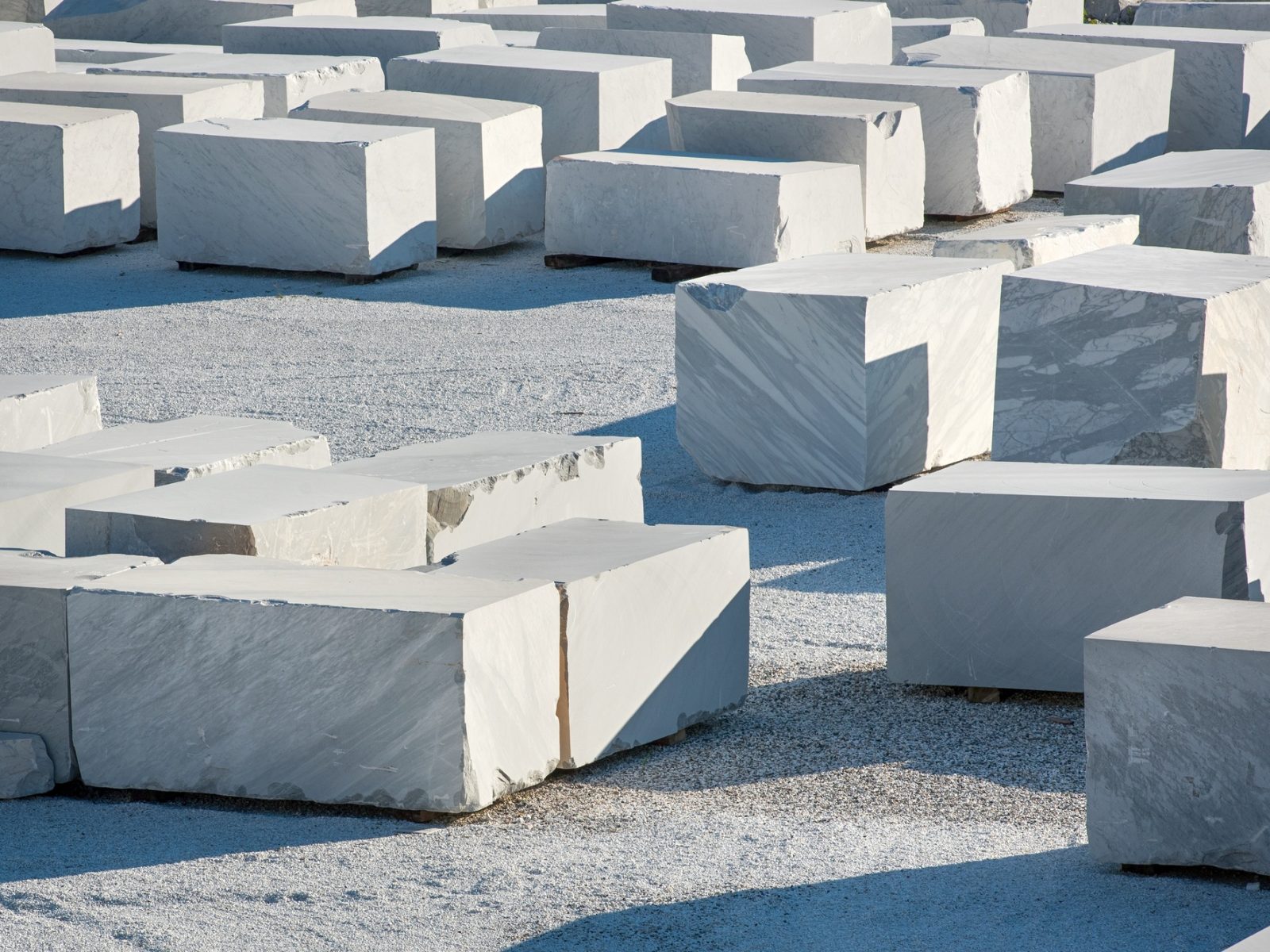 Large rectangular blocks of white Carrara marble